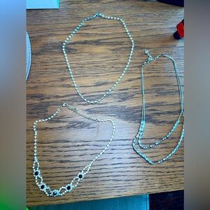 Bundle of 3 silver coloured necklaces some with gems